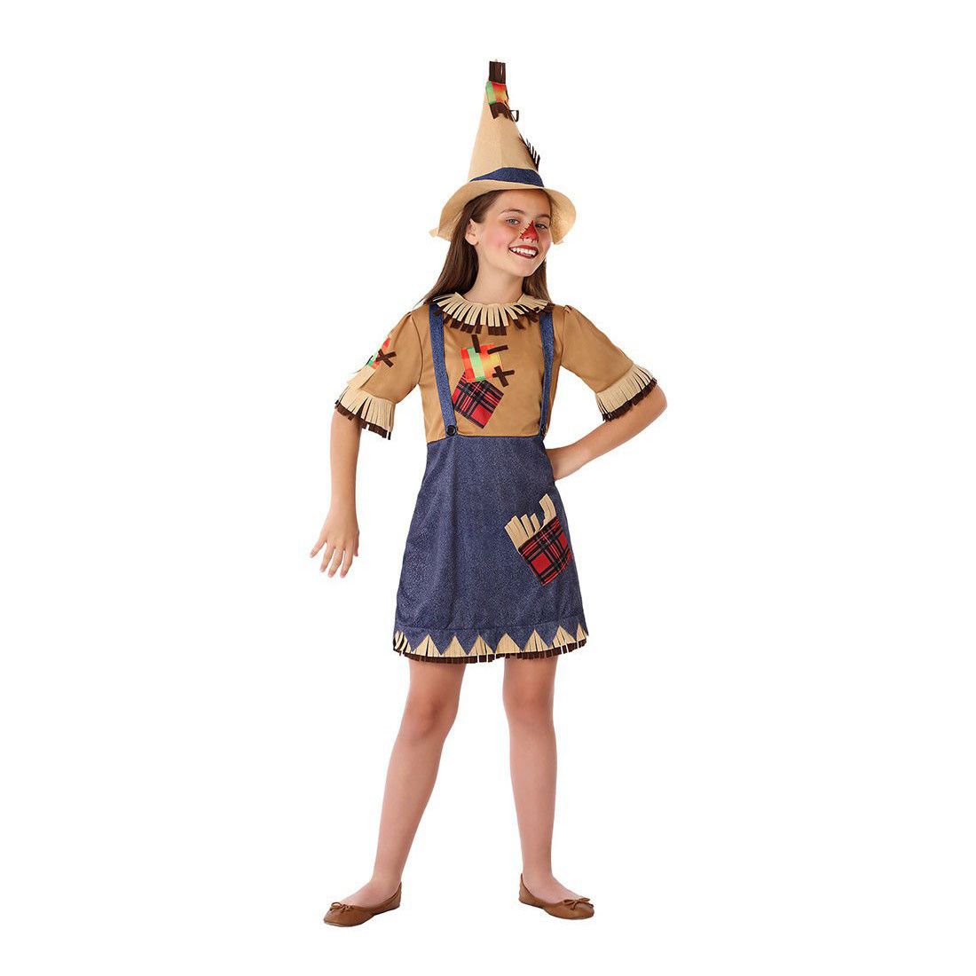 Fillette en déguisement d'épouvantail avec chapeau pointu de paille et robe à patchs